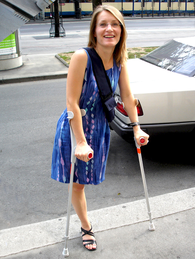 - Amputee woman on crutches! 