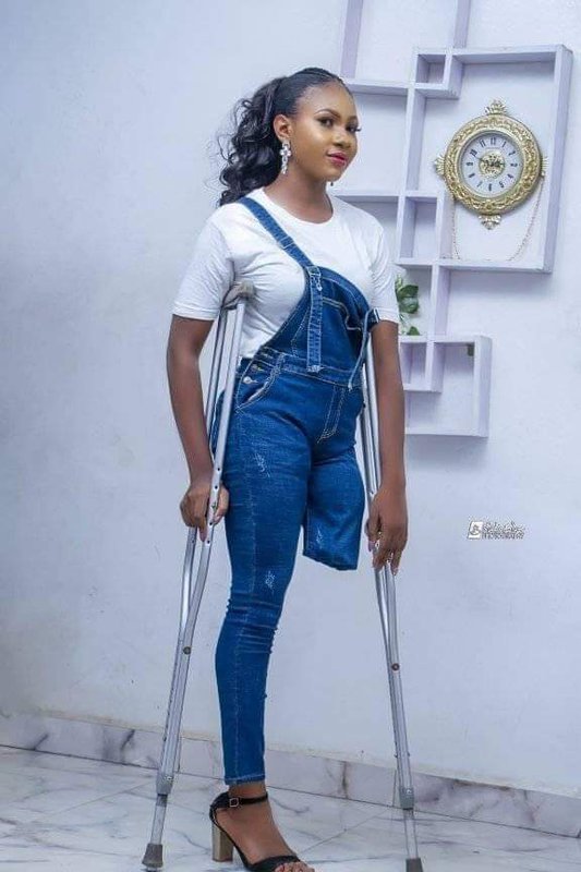 - Amputee woman on crutches! 