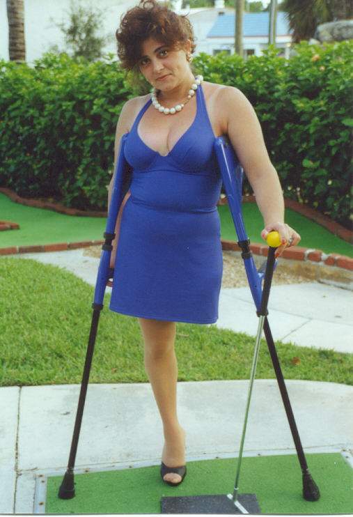 - Amputee woman on crutches! 